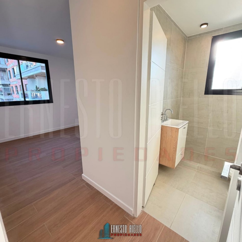 VENTA SEMIPISO 3 AMBIENTES A ESTRENAR CON COCHERA EN QUILMES CENTRO.