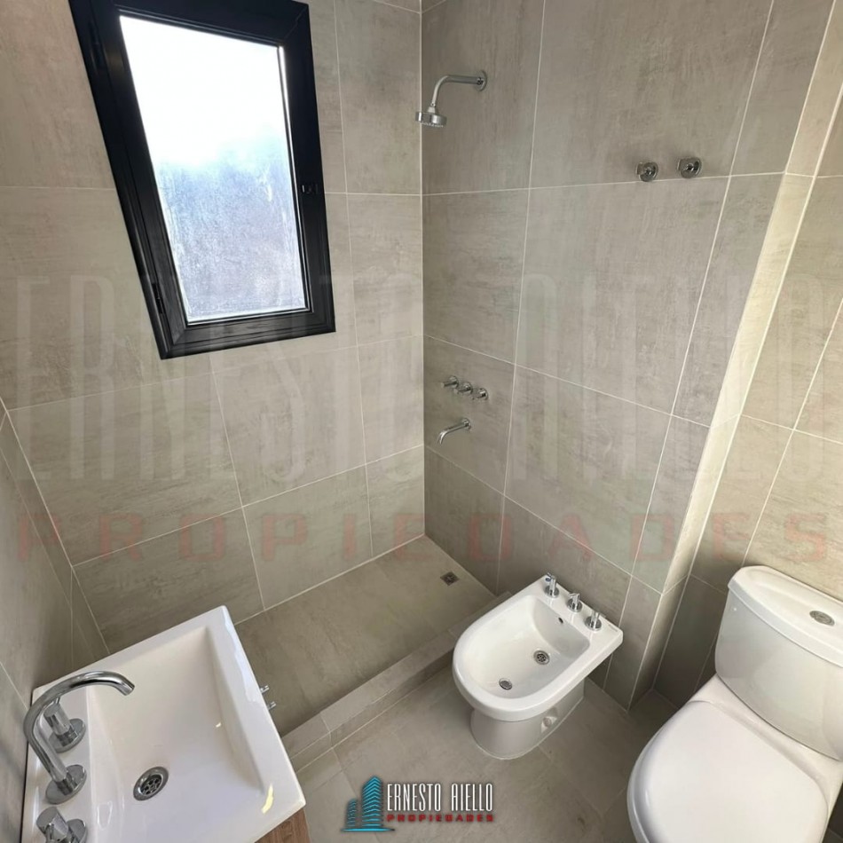 VENTA SEMIPISO 3 AMBIENTES A ESTRENAR CON COCHERA EN QUILMES CENTRO.